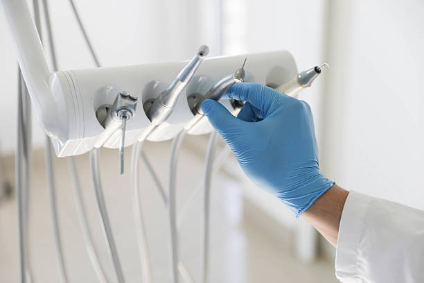 Professional Tooth Extraction technician working in Roanoke, TX